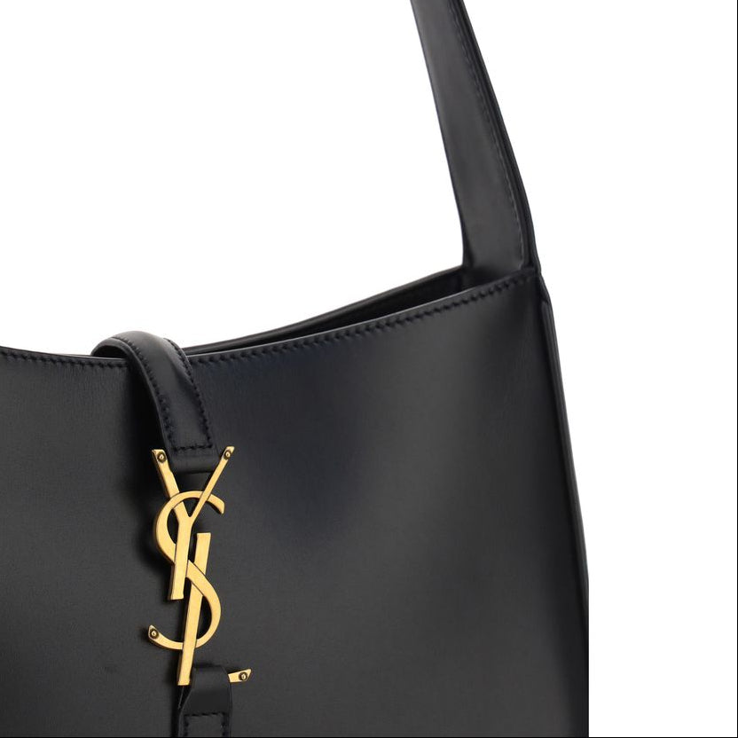 Saint Laurent Le 5 à 7 leather shoulder bag with YSL logo close up